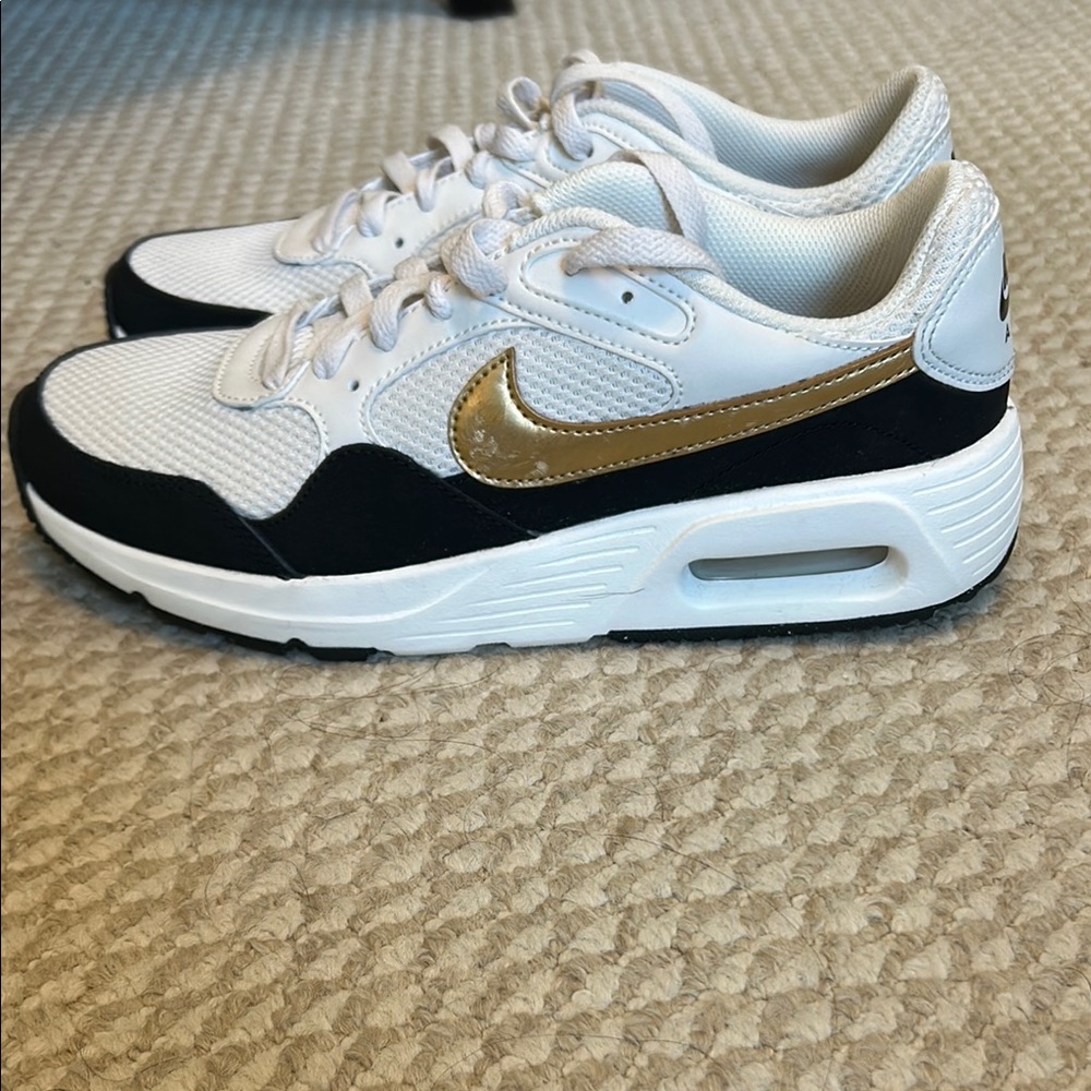 Nike Women’s Air Max SC White Gold and Black Sneakers with Metallic Swoosh